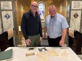 Sandy Rodger, left, and Martin Reid. Second World War documents that belonged to Mr Rodger's late father Ian were found hidden in a desk bought by Mr Reid