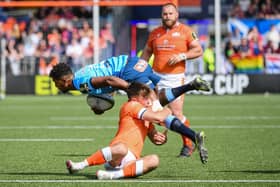 Canan Moodie of Vodacom Bulls is tackled by Edinburgh's Ross Thompson during the EPCR Challenge Cup quarter-final at Hive Stadium on April 12.