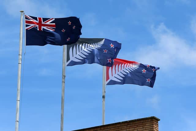 A New Zealand flag, left, flies alongside two suggested replacements (Picture: Fiona Goodall)