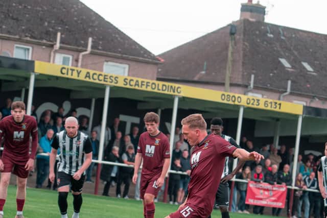 Dean Brett takes a penalty for Tranent.