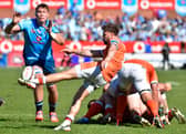 Ali Price of Edinburgh kicks clear during the United Rugby Championship quarter-final against the Bulls at Loftus Versfeld. 