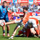 Ali Price of Edinburgh kicks clear during the United Rugby Championship quarter-final against the Bulls at Loftus Versfeld. 