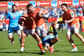 Magnus Bradbury of Edinburgh is tackled by the Bulls' Sebastian de Klerk during the URC quarter-final at Loftus Versfeld.