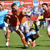 Magnus Bradbury of Edinburgh is tackled by the Bulls' Sebastian de Klerk during the URC quarter-final at Loftus Versfeld.