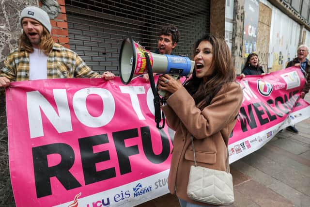 Protesters in Hamilton outside the Reform UK office