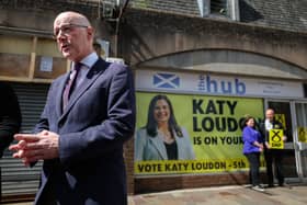 John Swinney outside the SNP’s base in Hamilton, Larkhall and Stonehouse before the by-election.