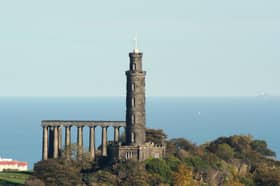 The time ball is dropped down a pole at the top of Nelson Monument in Edinburgh at 1pm.