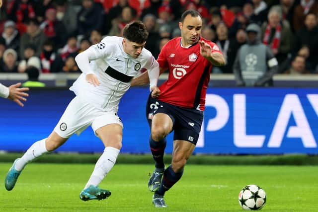 Scotland's Max Johnston (left) in action for Sturm Graz during a Champions League match against Lille in France in December 2024. (Photo by DENIS CHARLET/AFP via Getty Images)