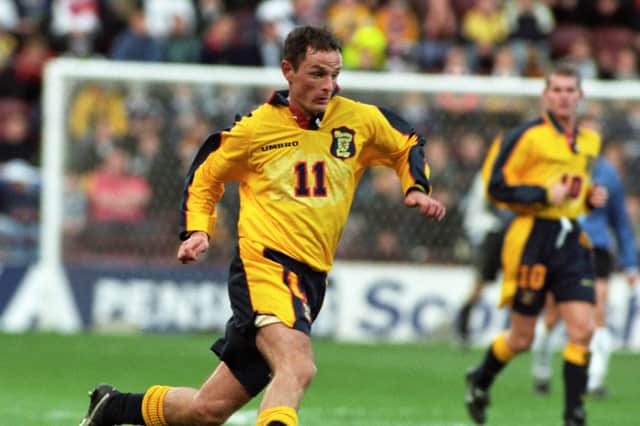 Allan Johnston, the father of Max Johnston, in action for Scotland in a 3-2 win over Estonia at Tynecastle in 1998.