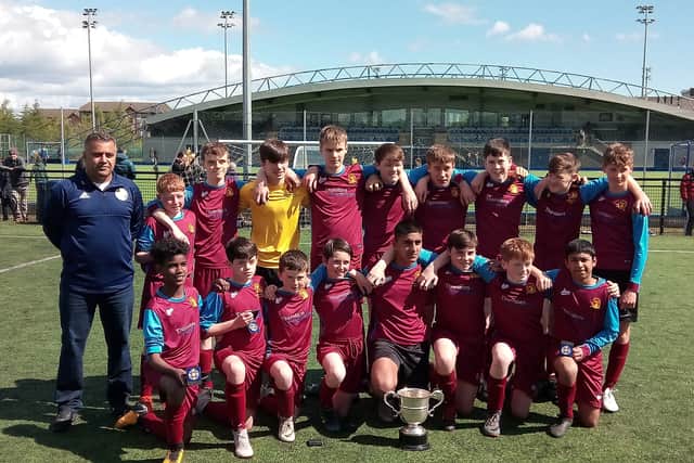 Rayan Mohammed, middle front, with the James Gillespie's High School S2 team in 2019.