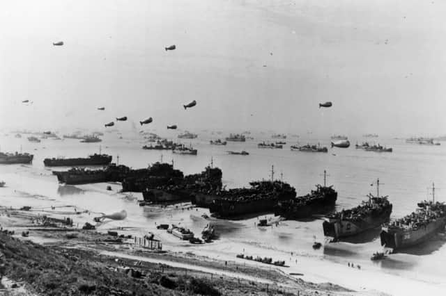 Land craft, barrage balloons and ships at Omaha beach shortly after the invasion in June 1944 (Picture: Three Lions)