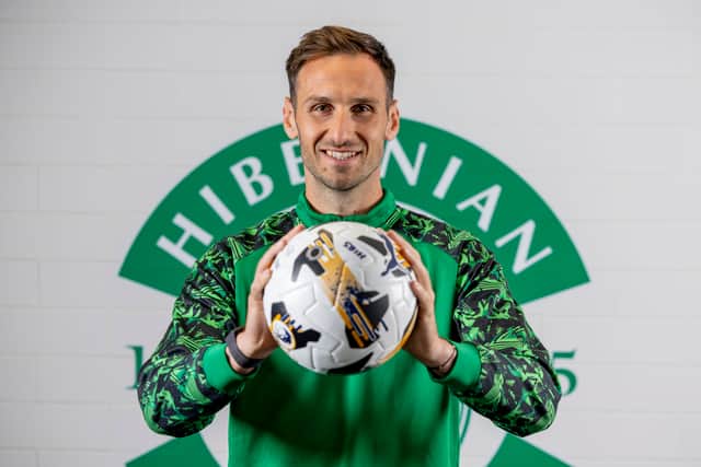 Raphael Sallinger signs for Hibs. Picture: Alan Rennie
