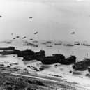 Land craft, barrage balloons and ships at Omaha beach shortly after the invasion in June 1944 (Picture: Three Lions)