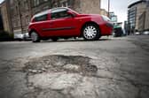 Edinburgh's streets have become littered with potholes of various sizes in recent years (Picture: Jane Barlow)