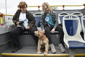 Reform UK supporters on the party's branded open top bus on polling day. Picture: John Devlin