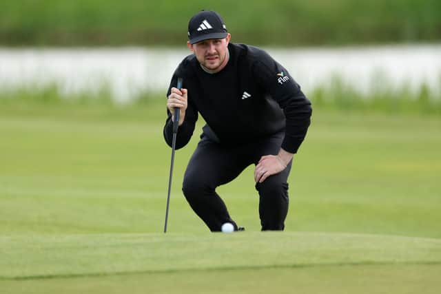 Connor Syme lines up a putt on day one of the KLM Open at The International in Amsterdam