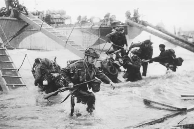Members of the Royal Marines land on Juno beach, Normandy, on D-Day (Picture: Hulton Archive)