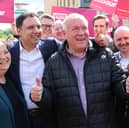 Scottish Labour deputy leader Jackie Baillie, the party's leader Anas Sarwar and Davy Russell celebrate during a rally on Castle Street, Hamilton, after he was declared the winner for the Hamilton, Larkhall and Stonehouse by-election