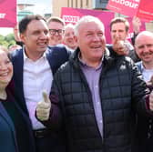 Scottish Labour deputy leader Jackie Baillie, the party's leader Anas Sarwar and Davy Russell celebrate during a rally on Castle Street, Hamilton, after he was declared the winner for the Hamilton, Larkhall and Stonehouse by-election