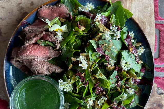Smoked venison fillet on a bed of orache, primrose leaves, sorrel , rowan blossom and toasted beech nuts for lunch. As foraged and photographed by Virginia Hutchison.
