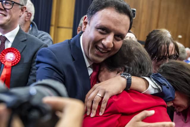 Anas Sarwar, leader of the Scottish Labour party, celebrates with deputy leader Jackie Baillie.