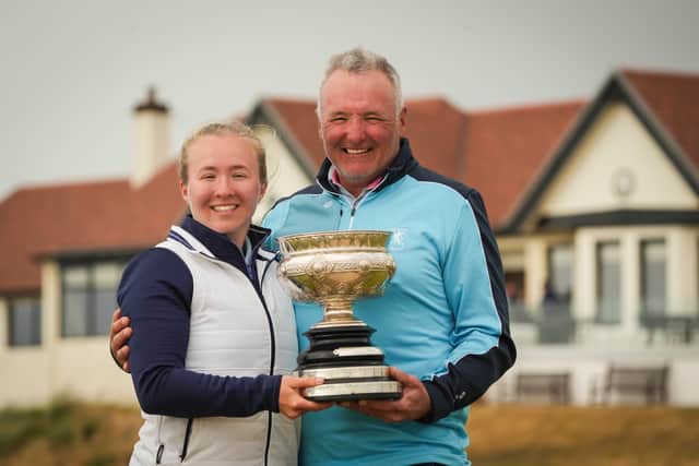 East Kilbride’s Susan Woodhouse shows off the trophy along with her dad Douglas after winning the 2025 Scottish Women's Amateur at Western Gailes 