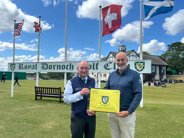 Royal Dornoch general manager Neil Hampton, left, and captain Gary Bethune with the special pin flags which will be sent to Donald Ross-designed courses in North America which are celebrating their centenaries