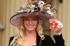 Michelle Mone shows off her OBE, awarded at an investiture ceremony at Buckingham Palace in 2010 (Picture: Dominic Lipinski/WPA pool)