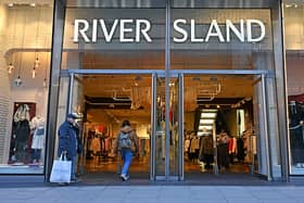 Hundreds of jobs are at risk at River Island as part of plans to shut 33 of its UK stores.