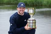 Connor Syme shows off the trophy after landing his maiden DP World Tour win in the KLM Open at The International Golfclub in Badhoevedorp