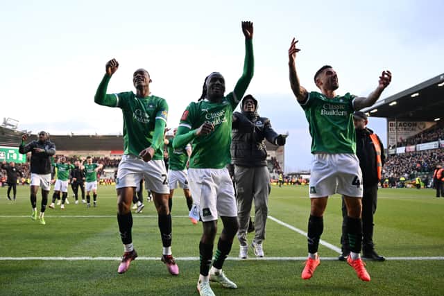 Victor Palsson and his Plymouth teammate celebrate beating Liverpool in the FA Cup last season.