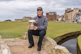 Cameron Adam shows off the St Andrews Links Trophy after winning in a play-off at the home of golf