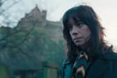 Merrit Lingard, played by Chloe Pirrie, pictured with Edinburgh Castle in the background. But where was the scene shot?