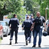 Police officers attend the scene of a shooting at a school in Graz, Austria. Picture: Kleine Zeitung via AP