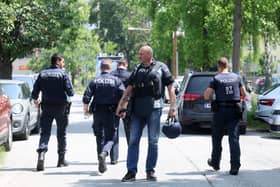 Police officers attend the scene of a shooting at a school in Graz, Austria. Picture: Kleine Zeitung via AP