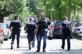 Police officers attend the scene of a shooting at a school in Graz, Austria. Picture: Kleine Zeitung via AP