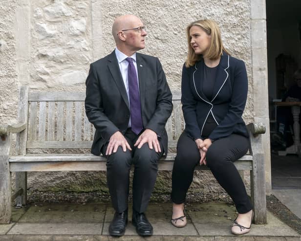 SNP leader John Swinney and Mairi McAllan, who is returning to work after maternity leave