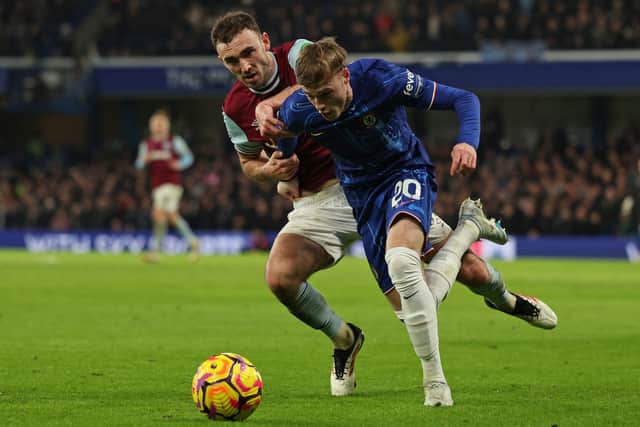 West Ham's Andy Irving challanges Chelsea's Cole Palmer during a Premier League appearance in February.   (Photo by ADRIAN DENNIS/AFP via Getty Images)
