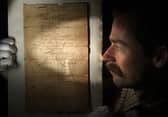 Tommy Alexander, valuer at Great Western Auctions, with the newly discovered handwritten original manuscript of a poem by Scottish Enlightenment poet Allan Ramsay (1684-1758), which is expected to fetch £800 - £1,200 at GWA Summer Two Day Fine Art & Antiques Auction on Friday and Saturday.