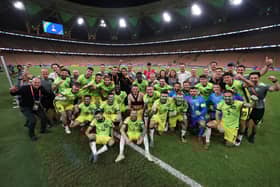 Hibs duo Martin Boyle and Lewis Miller are front and centre as the Australia squad pose for a picture after securing qualification for the 2026 World Cup. (Photo by Robert Cianflone/Getty Images)