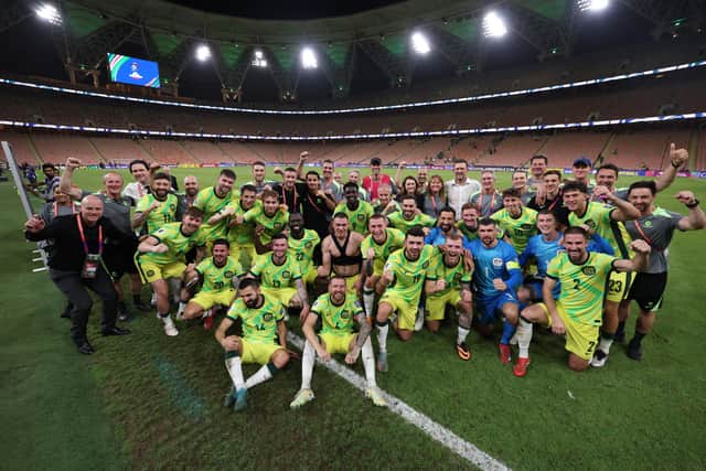 Hibs duo Martin Boyle and Lewis Miller are front and centre as the Australia squad pose for a picture after securing qualification for the 2026 World Cup. (Photo by Robert Cianflone/Getty Images)