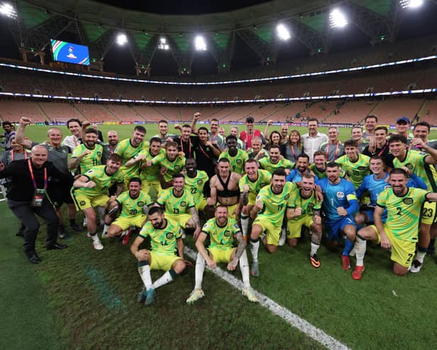 Hibs duo Martin Boyle and Lewis Miller are front and centre as the Australia squad pose for a picture after securing qualification for the 2026 World Cup. (Photo by Robert Cianflone/Getty Images)