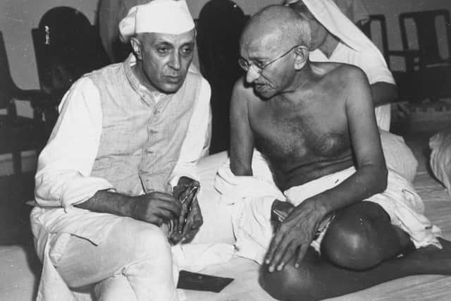 Mahatma Gandhi and Jawaharlal Nehru in conversation at the All-India Congress committee meeting at Bombay, 1946