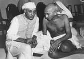 Mahatma Gandhi and Jawaharlal Nehru in conversation at the All-India Congress committee meeting at Bombay, 1946