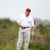 Donald Trump pictured at the opening of Trump International Golf Links in 2012 