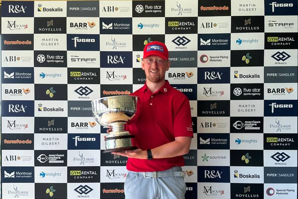 Greg Dalziel shows off the trophy after winning the Portlethen Classic presented by Entier