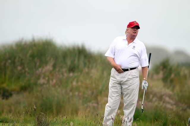 Donald Trump pictured at the opening of Trump International Golf Links in 2012 