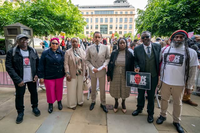 Solicitor Aamer Anwar alongside Shehu Bayoh's sisters and supporters outside Capital House in Edinburgh, ahead of a two-day hearing focusing on the fairness of the conduct and procedure adopted by the inquiry chairman in meeting with the families of Sheku Bayoh
