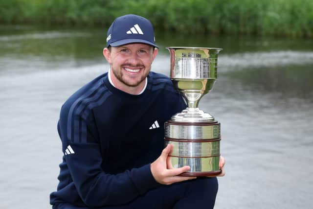 Connor Syme shows off the trophy after winning the 105th edition of the KLM Open at The International in Amsterdam last weekend