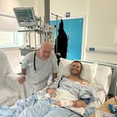 Brian Innes with son Kieran in hospital